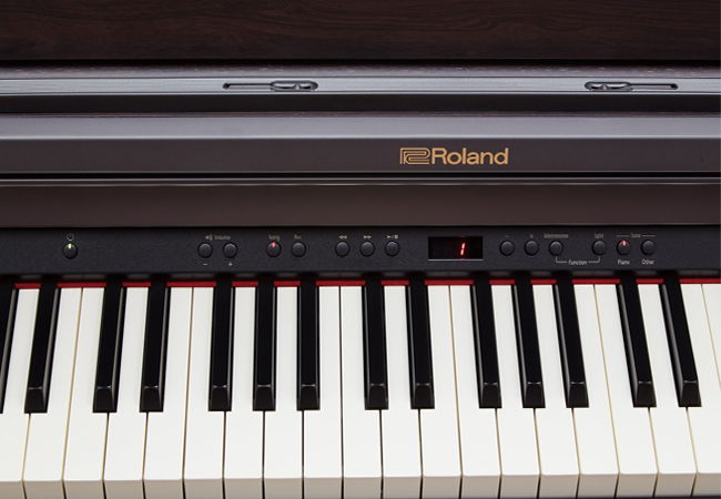 piano điện roland 302 .